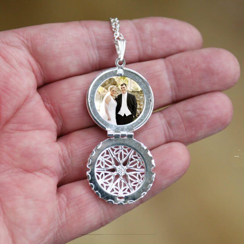 circular filigree locket on a necklace chain